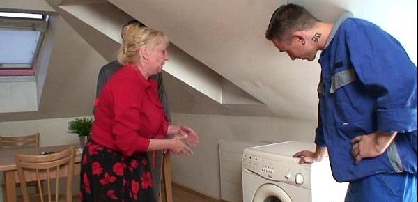  Lonely grandma spreads legs for two repairmen